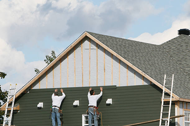 Professional Siding technician working in Stockbridge, GA
